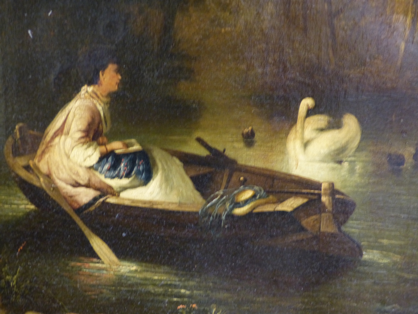 A 19TH CENTURY OIL ON CANVAS OF A GIRL AND A SWAN, 35.5 X 42.5CM.