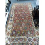 AN ANTIQUE CAUCASIAN KAZAK RUG. 250 X 132CMS