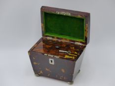 A HALLMARKED SILVER AND TORTOISE SHELL TEA CADDY COMPLETE WITH A WORKING LOCK AND KEY. TOWN MARK