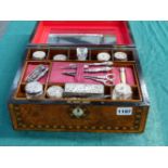 A VICTORIAN WALNUT AND TUNBRIDGE INLAID DRESSING CASE WITH SILVER MOUNTED FITTINGS.