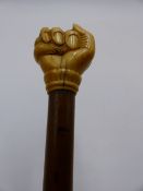 A 19TH CENTURY ENGLISH OR EUROPEAN CARVED IVORY TOP WALKING CANE WITH HANDLE IN THE FORM OF HAND