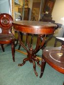 A 19TH.C.WALNUT OCCASIONAL TABLE ON PIERCED SUPPORTS. 62CMS WIDE.