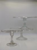 A NEAR PAIR OF ANTIQUE FOOTED GLASS TAZZAS. 30CMS DIAMETER AND A SMALLER EXAMPLE (3)