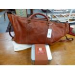 A GOOD QUALITY CONNELLY HIDE HOLDALL.