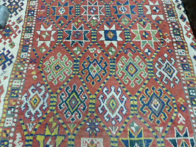 AN ANTIQUE CAUCASIAN KAZAK RUG. 250 X 132CMS - Image 4 of 9