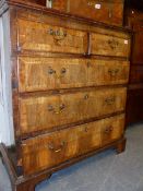 AN 18TH.C.WALNUT CHEST OF TWO SHORT AND THREE LONG DRAWERS ON BRACKET FEET. 97CMS WIDE