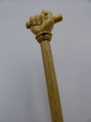 A 19TH CENTURY ENGLISH OR EUROPEAN IVORY TOP WALKING CANE WITH HANDLE FINELY CARVED IN THE FORM OF