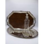 A GLASS DECANTER WITH SILVER COLLAR, TOWN MARK BIRMINGHAM, CIRCA 1907, A WHITE METAL PLATTER