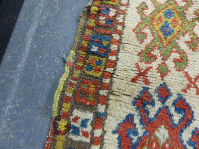 AN ANTIQUE CAUCASIAN KAZAK RUG. 250 X 132CMS - Image 6 of 9