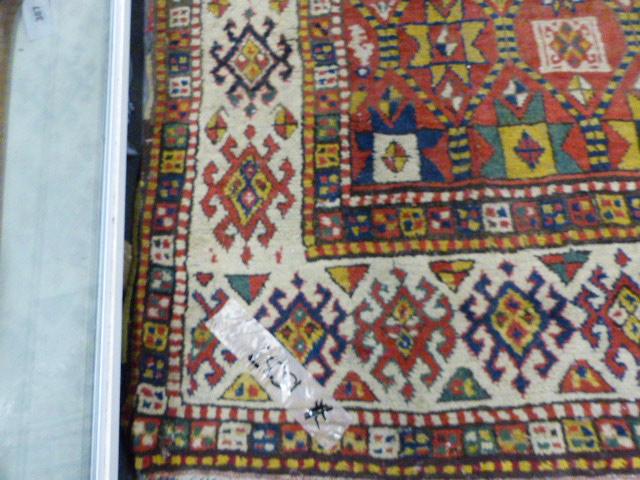 AN ANTIQUE CAUCASIAN KAZAK RUG. 250 X 132CMS - Image 2 of 9