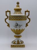 A MEISSEN TWIN HANDLE NEO CLASSICAL DESIGN COVERED URN, GILT RELIEF DECORATION WITH GRISAILLE