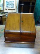 A VICTORIAN MAHOGANY SLOPE TOP FITTED STATIONERY CABINET.