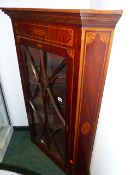 A GOOD GEORGIAN MAHOGANY AND BOXWOOD INLAID GLAZED CORNER CABINET. 122CMS HIGH.