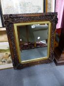 A VICTORIAN OAK GRAINED AND MOULDED MIRROR FRAME WITH ACORN AND LEAF DECORATION. 67X58CMS.