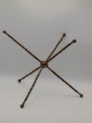 A 19TH.C.TURNED WROUGHT STEEL CAT OR PLATE STAND, APPROX 52CMS (MAX)