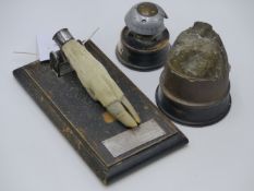 TWO WWI BATTLERFIELD RELICS, A GERMAN SHELL FUSE TIMER WITH LABEL THE CALVERT MENIN ROAD YPRES