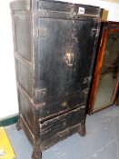 A 19TH CENTURY JAPANESE WOODEN SMALL CABINET WITH CUPBOARD AND DRAWERS DECORATED WITH SHAPED IRON