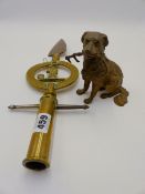 A 19TH CENTURY GILT BRONZE DESK INWELL IN THE ORM OF A SEATED DOG TOGETHER WITH A BRASS AND IRON