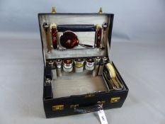 AN EARLY 20TH. CENTURY PIGSKIN LEATHER FITTED VANITY CASE TO INCLUDE VARIOUS HALLMARKED SILVER AND