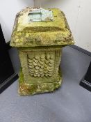 AN ANTIQUE PATINATED BRASS SMALL SUNDIAL ON WEATHERED STONEWARE PLINTH.