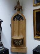AN UNUSUAL LATE VICTORIAN CARVED PINE GOTHIC STYLE SHELF