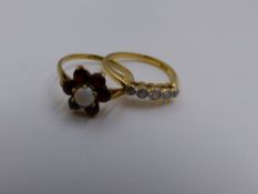 AN 18CT. STAMPED YELLOW GOLD AND FIVE STONE GRADUATED DIAMOND RING, TOGETHER WITH A YELLOW METAL