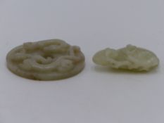 TWO PIECES OF CHINESE CARVED JADE, A PEACH AND AN ARCHAIC DESIGN PENDANT.