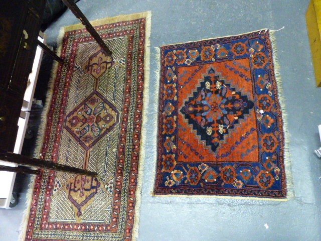 AN UNUSUAL ANTIQUE PERSIAN SERAB SMALL RUG 138X60CMS AND AN ANTIQUE PERSIAN AFSHAR BAG FACE.