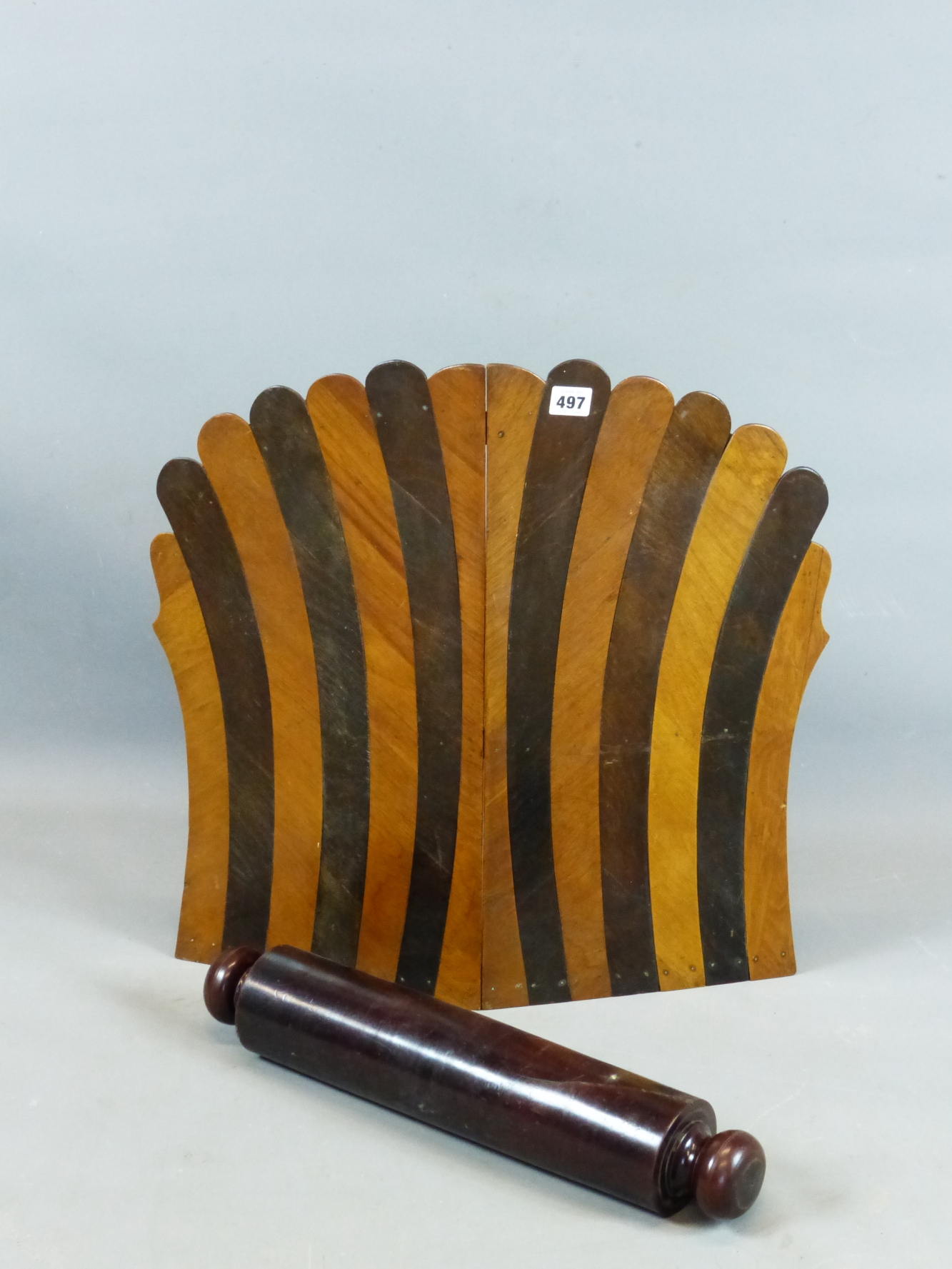 A LARGE 19TH CENTURY MAHOGANY ROLLER TOGETHER WITH A BI-FOLD SPECIMEN WOOD SCREEN