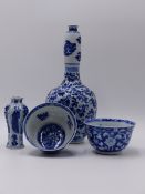 A CHINESE EXPORT BLUE AND WHITE SHAPED FORM BOTTLE VASE WITH FOUR CHARACTER MARK UNDERFOOT, A PAIR