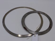 TWO ANTIQUE INDIAN SIKH CHAKRAM, BLADED THROWING DISKS OF SHAPED PROFILE. 28CMS. & 21CMS.