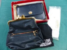 A MOSSCHINO LADIES BAG TOGETHER WITH A CELINE OF PARIS CLUTCH BAG AND DENT'S GLOVES