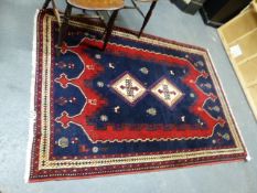 A PERSIAN AFSHAR RUG. 188X132CMS AND A BELOUCH RUG. 192X100CMS (2)