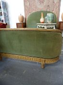 A FRENCH DOUBLE BED WITH CARVED AND PAINTED SHOW FRAME.