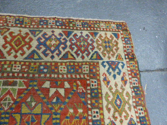 AN ANTIQUE CAUCASIAN KAZAK RUG. 250 X 132CMS - Image 7 of 9