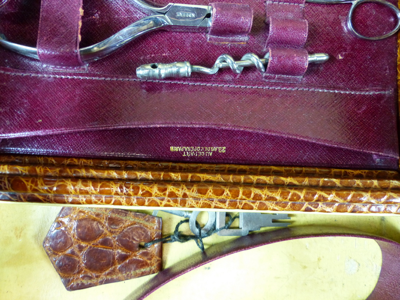 AN EARLY 20TH CENTURY CROCODILE LEATHER TRAVELLING VANITY CASE. PART FITTED WITH VARIOUS WHITE METAL - Image 5 of 14