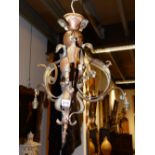 A LATE 19TH.C.WROUGHT BRASS CHANDELIER IN THE MANNER OF W A S BENSON.