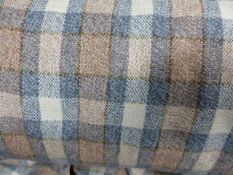 A BOLT OF BLUE AND TAUPE WOOLLEN PLAID.