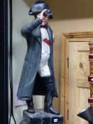 A CARVED FOLK ART POLYCHROME FIGURE OF NAPOLEON HOLDING A SPY GLASS. 102CMS HIGH.