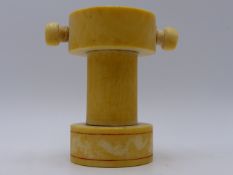 A 19TH. CENTURY CARVED IVORY MODEL OF A SHIP'S CAPSTAN. 9.5 CMS. HIGH