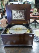 AN INTERESTING 19TH CENTURY POLYPHON MUSIC BOX PLATYNG 12" DISCS OVER TWIN COMBS SIGNED SHUTZ MARK