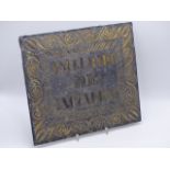 A 19TH CENTURY CONTINENTAL CARVED SLATE PLAQUE WITH GILT DECORATION