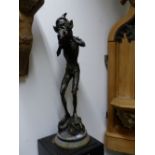 AN UNUSUAL PATINATED GARDEN FIGURE OF AN IMP. 82CMS HIGH OVERALL.