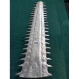 AN INTERESTING CAST ALLOY SAWFISH ROSTRUM ON A LIMESTONE BASE. 99CMS HIGH OVERALL.