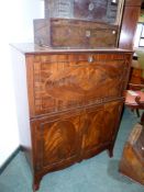 AN INLAID MAHOGANY REGENCY SECRETAIRE CABINET, FITTED INTERIOR ABOVE TWO DOOR CUPBOARD SECTION,