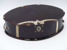 A TWO HANDLED OVAL WHITE METAL STRAP WORK TORTOISE SHELL BOX. (APPROX WIDTH 23.5 CMS).