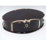 A TWO HANDLED OVAL WHITE METAL STRAP WORK TORTOISE SHELL BOX. (APPROX WIDTH 23.5 CMS).