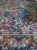 AN UNUSUAL PAIR OF ANTIQUE PERSIAN KIRMAN MATS. 52X52CMS