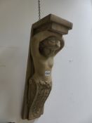 A PAIR OF CARVED WOOD ARCHITECTURAL SUPPORTS. 57CMS HIGH.