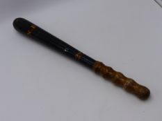A VICTORIAN TRUNCHEON WITH ORIGINAL GILT AND RED PAINTED DECORATION "N.P. / 28"